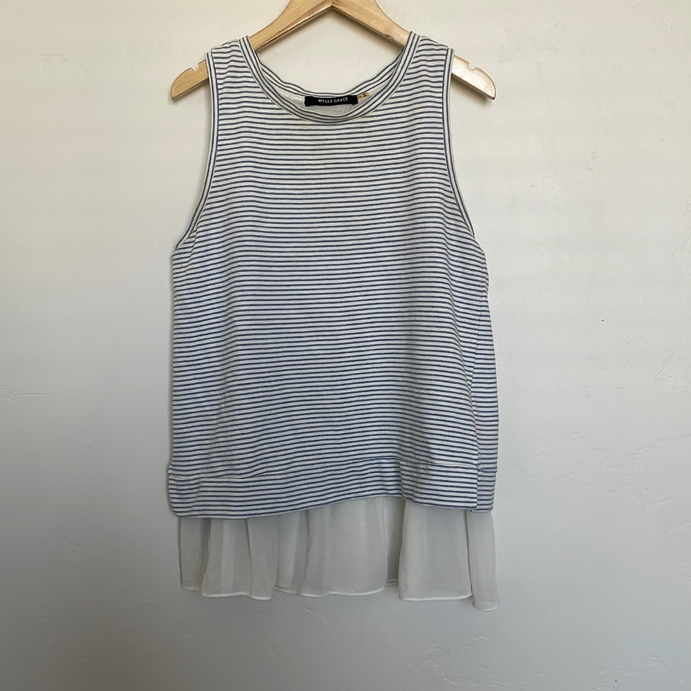 White and blue striped sleeveless blouse